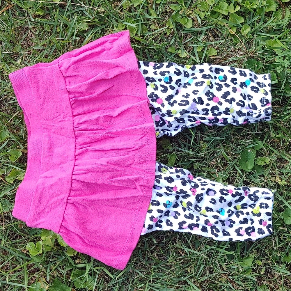 Garanimals. Rainbow splatter cheetah print leggings with hot pink skirt.